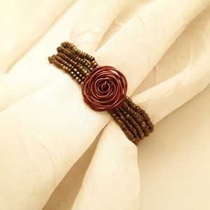 Bronze Friendship Bead Bracelet With Rose Charm